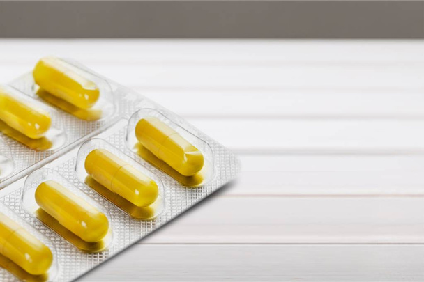yellow gelatin pills - Фото, изображение
