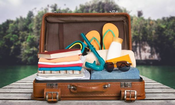 Retro suitcase with travel objects - Foto, Imagem