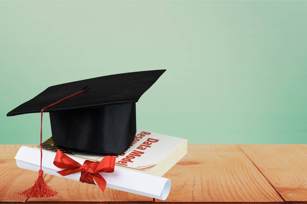Graduation hat and diploma - Foto, Imagem