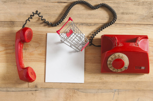 Retro rotary telephone on wood table - Photo, Image