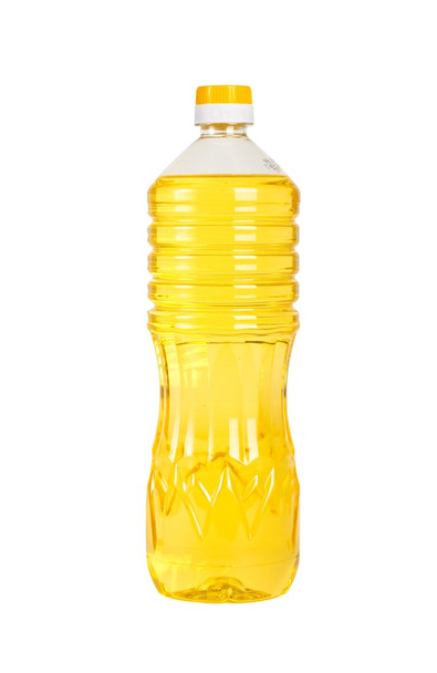 Fles zonnebloemolie geïsoleerd op witte achtergrond - Foto, afbeelding