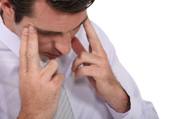 Empresário sofrendo de dor de cabeça
 - Foto, Imagem