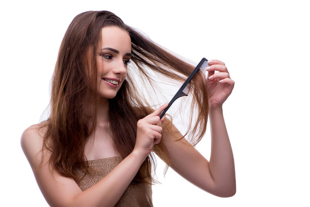 Woman in beauty concept combing hair - Valokuva, kuva