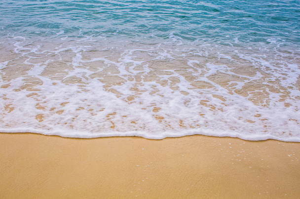 sabbia marrone con uno sfondo onda spiaggia
 - Foto, immagini