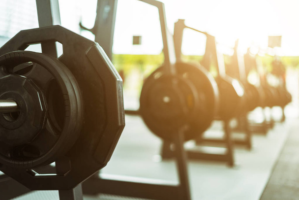 Fitness background with barbells in gym, sport concept - Foto, Imagem