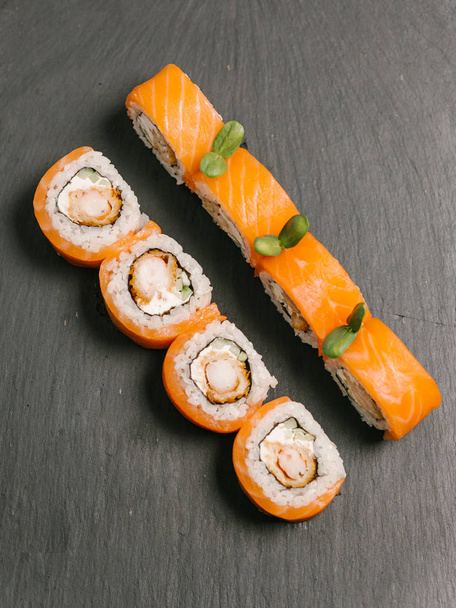 Sushi rolls with salmon - Фото, изображение