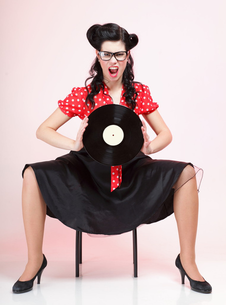 Pin-up girl style retro woman analogue record - Foto, imagen