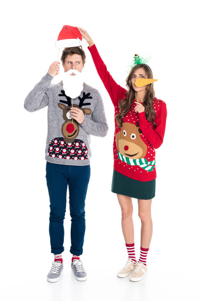 couple with christmas paper accessories - Zdjęcie, obraz