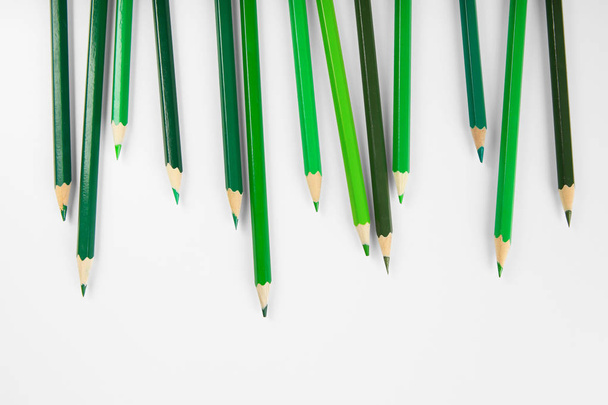 Green pencils of different shades - Фото, изображение