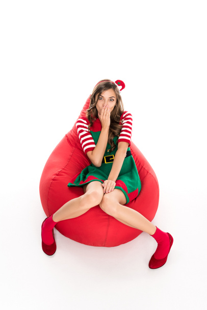 woman in elf costume on bag chair - Fotó, kép