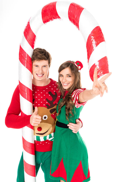 pareja con lollipop decorativo de Navidad
 - Foto, imagen