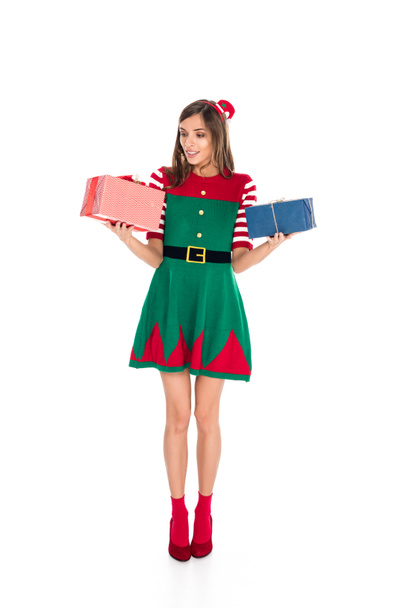 mujer en traje de elfo con regalos
 - Foto, Imagen
