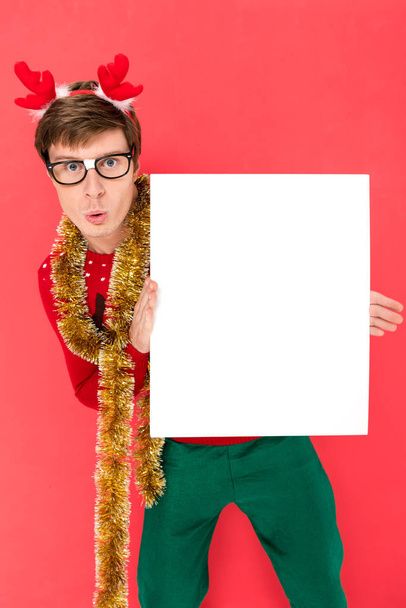 man in sweater with blank banner - Photo, Image