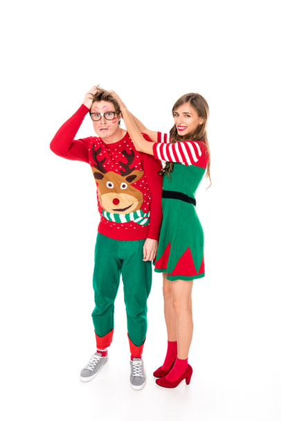 couple in festive christmas costumes - Фото, изображение