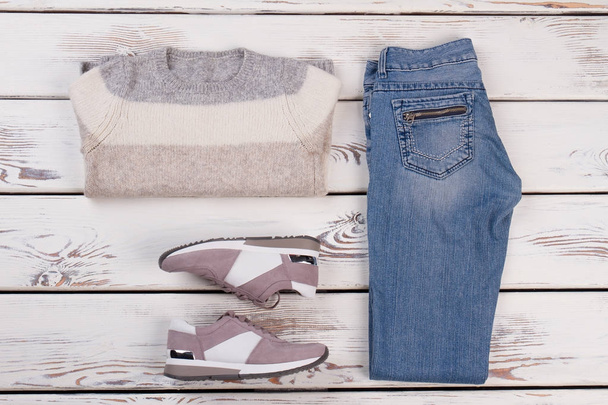 Blue jeans and striped pullover - Photo, Image