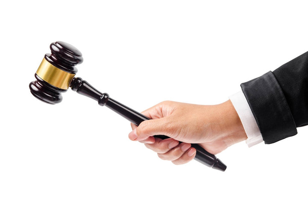 wooden gavel in hand. - Photo, Image