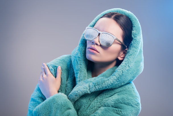 woman with frost on face wearing robe - Photo, Image