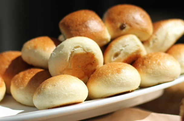 Fresh wheaten round buns on a white tray - Photo, Image