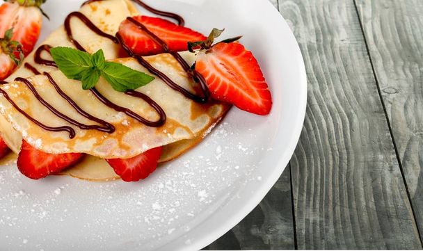 Delicious pancakes with chocolate - Photo, image