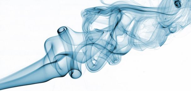 Blue abstract smoke from the aromatic sticks on a white background. - Zdjęcie, obraz