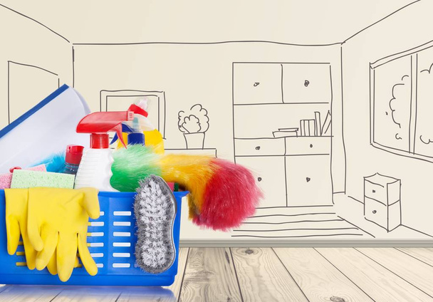 Cleaning supplies in basket isolated on  background  - Φωτογραφία, εικόνα