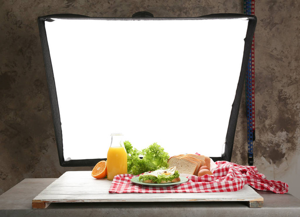 Photo studio with professional lighting equipment during shooting food - Foto, immagini