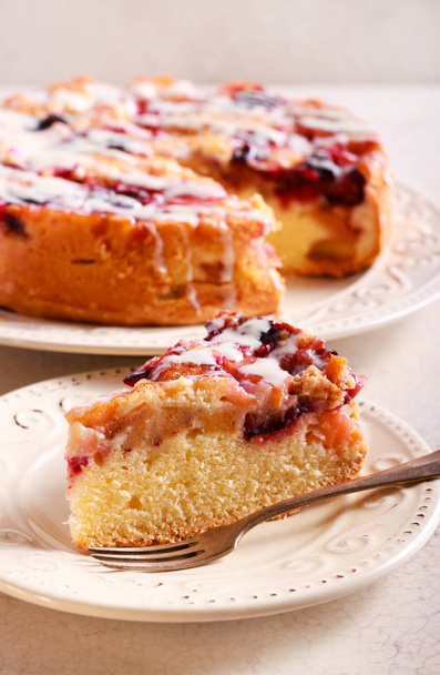 Mixed fruit cake with icing drizzle  - Photo, Image