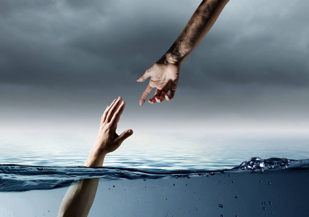Hand of person drowning in water - Valokuva, kuva