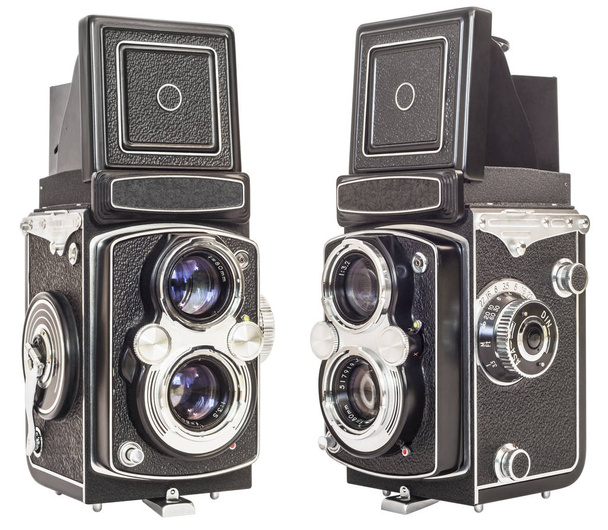 Deux mêmes caméras Reflex à lentilles jumelles isolées sur fond blanc
 - Photo, image
