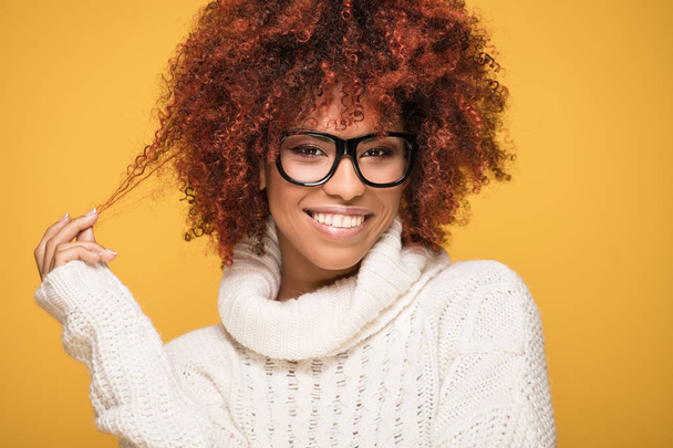 Young african american girl on yellow background. - Valokuva, kuva