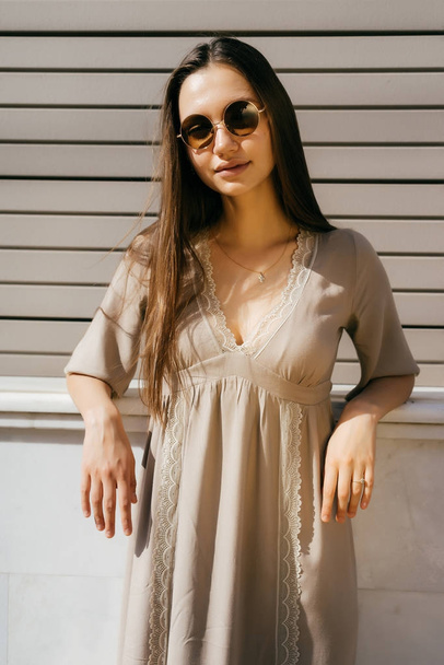 Fashionable young woman in sunglasses, round glasses - Photo, Image