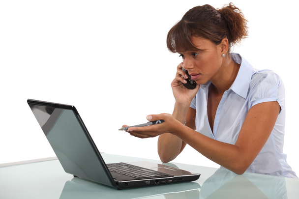 Businesswoman calling technical help desk - Foto, immagini