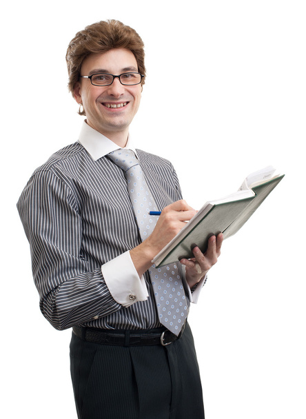 Smiling business man taking notes - Foto, imagen