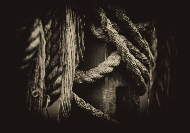Horizontal vintage vignette sepia medieval ship ropes detail clo - 写真・画像