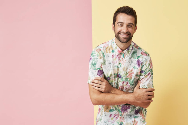 Happy guy in floral shirt  - Фото, зображення