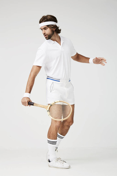 Focused tennis player holding racket - Foto, immagini