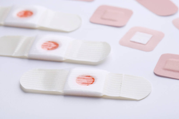 Medical plasters on a white background - Foto, Imagen
