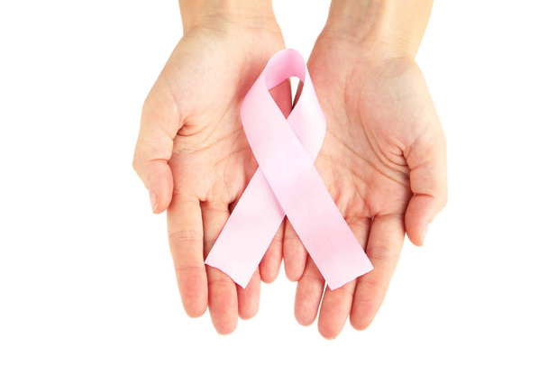 Female hands holding pink ribbon  - Fotografie, Obrázek