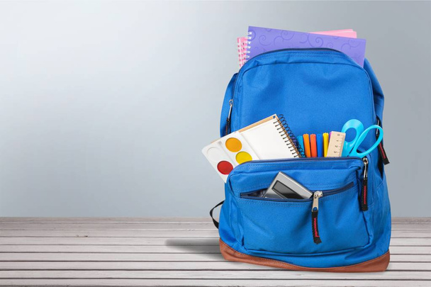 School Backpack with stationery - 写真・画像