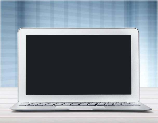Laptop with blank screen - Фото, изображение