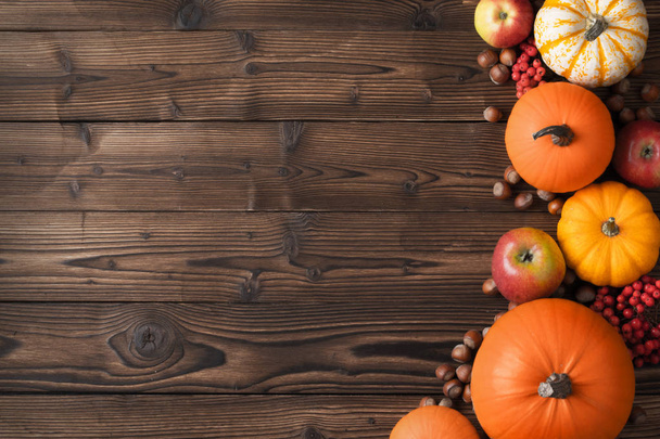Autumn harvest on wooden table - Fotografie, Obrázek