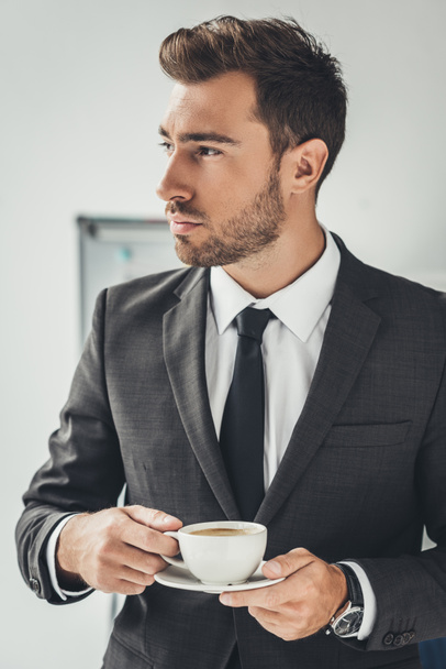 businessman with cup of coffee - 写真・画像