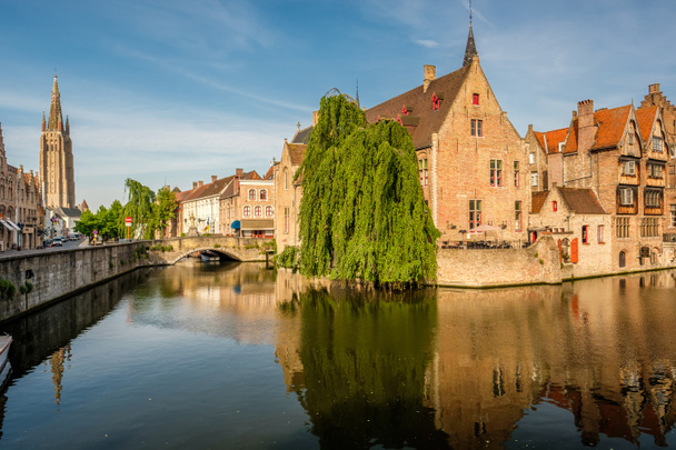 Bruges cityscape with water canal - Photo, Image