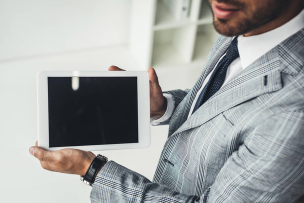 businessman holding blank tablet - Φωτογραφία, εικόνα