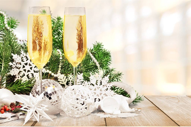 Champagne glasses with Christmas decorations  - Foto, imagen