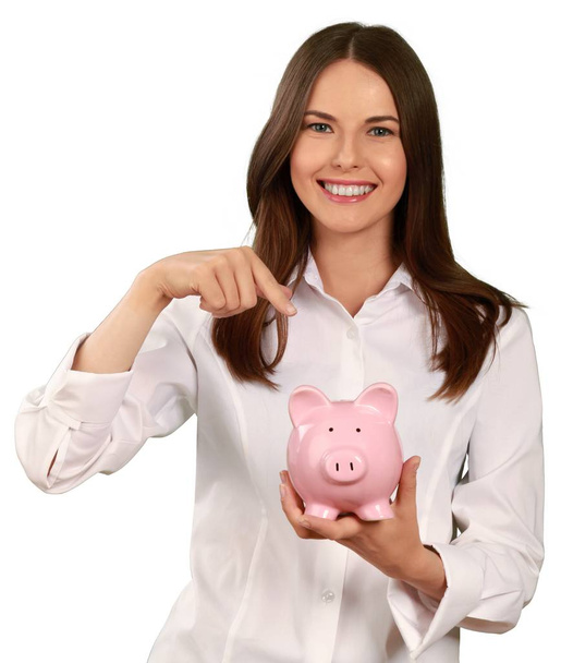 Businesswoman with piggy bank - Fotoğraf, Görsel