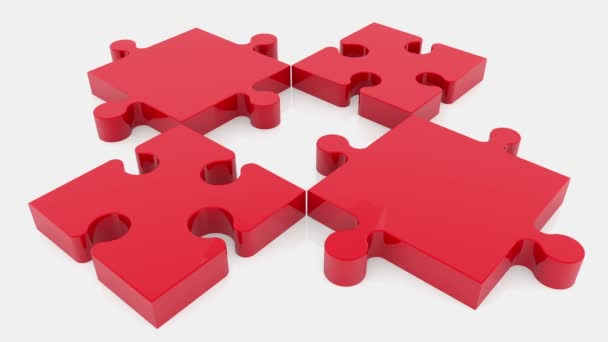 Quattro pezzi puzzle in rosso con volare in mezzo bianco
 - Filmati, video