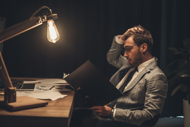 overworked businessman with paperwork  - Photo, Image