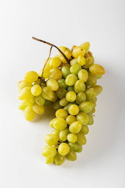 Closeup of green grapes on white background - Фото, изображение
