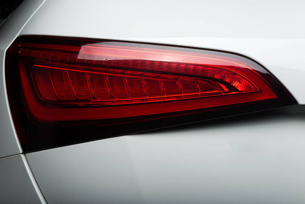 Car detailing series: Taillight of clean white car - Foto, Imagen